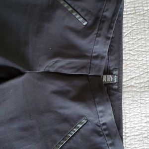 Black Alfani leather trimmed ankle pants